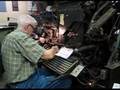Eldon Meeks runs a Linotype machine