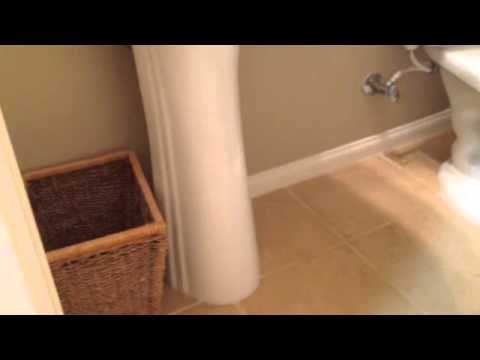 how to build a cabinet around a pedestal sink