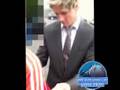 Fernando Torres signing Liverpool shirts!