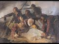 Van tre trima për të pinëΒαν τρε τρίμα περ τε πίνεa'i pari u liavos* mirëα'ι πάρι ου λιάβος μίρεMirmëni shok'o në krahëΜίρμενι σόκ'o νε κράχεtë më xirrni lia ga raqi*τε με τζίρνι λιά γκα ράχηMirmëni shok'o dufeqinΜίρμενι σόκ'o ντουφέκινkam tre vllezër e lie të kenëκάμ τρέ βλλέζερ ε λιέ τε κένεNτε θίστε μέμα τσ'ού μπε ντίαλιNdë thistë mëma ç'u bë djaliu martua lia ga maliού μαρτούα λιά γκά μάλιNτε θίστε μέμα τσέ νούσε μούαρNdë thistë mëma çë nuse muarkoqe plum në krahë muarκόκιε πλούμ νε κράχε μούαρNdë thistë mëma çë krushkë vanëNτε θίστε μέμα τσε κρούσκε βάνεshqipje kriezeza e hainσκίπιε κρίεζέζα ε χάινTej ga mali ga vatanëΤει γκά μάλι γκα βάτανεvranë kapedan Thomanëβράνε καπετάν Θωμάνε-a'i pari u liavos* mirë = ai i pari u plagos mirë (nuk thotë keq, thotë 