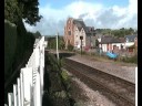 ON THE WEST SOMERSET RAILWAY IN JULY 2008.THE STATION FIRST OPENED IN 1862 AT THE END OF THE LINE TO SERVE THE BUSY PORT.THEN IT HAD MANY SIDINGS, A SIGNAL BOX AND A TURNTABLE.  NOW IT WELCOMES PASSING VISITORS WITH GARDENS, A PHOTOGRAPHIC DISPLAY OF ITS HISTORY, A SOUVENIR SHOP, A CUP OF TEA AND A WARM WELCOME!
