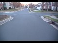 bombing a small hill while holding camera