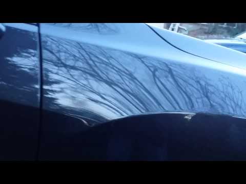 Paintless dent repair on Acura RDX after