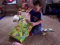 Braeden opening a birthday present