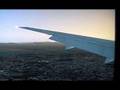 FSX Landing at CYVR 26L UA B777-200 wing view