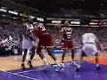 Kevin Johnson dunks over Hakeem Olajuwon