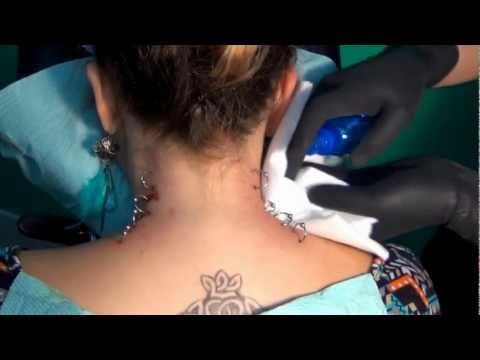 Corset Piercings on Neck Performed By: Andi Smith
