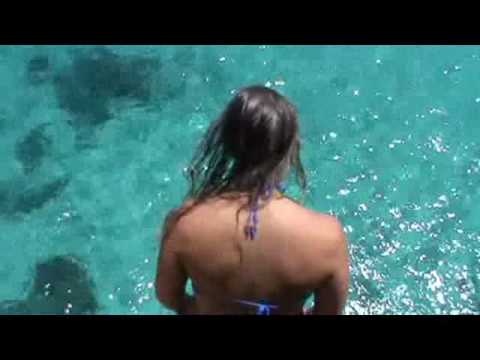 varques - Joy jumping off cliffs in cala varques mallorca.