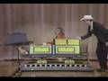 Walter Blaney performs his version of sawing a lady in half
