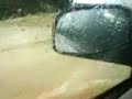 a dash for freedome! driving through flooded road near long marston - 20th july 2007.