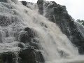 Tirathgarh falls are located around 40 kms from Jagdalpur in Bastar district of state of Chhatisgarh in Central India. The water falls from a height of 100 ft on a river which originates in a lake not very far. The ambience of falls is pristine, located among thick vegetation and water flowing down a velley. - Tirathgarh Falls