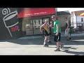 A young man rollerskates in his singlet...