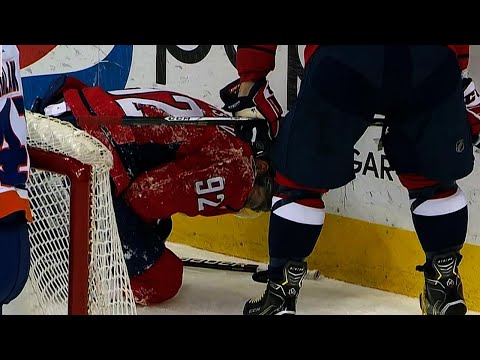 Video: Kuznetsov slams into boards after getting tripped by Islanders