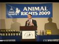 Alex Hershaft presents Nathan Runkle, Founder and Executive Director of Mercy For Animals the Animal Rights Hall of Fame Award. Raised on a farm in rural Ohio, Nathan has long had a deep connection with farmed animals and agriculture. After a local farmed animal abuse case, involving a piglet slammed head first into a concrete floor during an agriculture project at a nearby high school, Nathan founded Mercy For Animals to give 