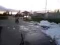 Fat man Ramps Snow Bank With Bmx Bike