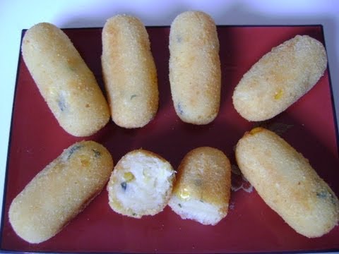 milho - Ingredientes: 2 xícaras de chá de leite, 1 lata de milho verde, 2 colheres de chá de sal, 100g de queijo parmesão ralado, noz moscada a gosto, cheiro verde a...