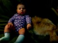Adrianna pets Elvis