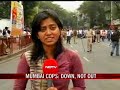 Mumbai cops down, but not out