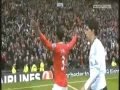 Patrice Evra Celebrates while Suarez walks.