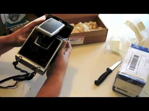 how to load a polaroid sx-70 land camera