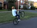 Toby wheelie on bike.. Toby wheelie on bike..