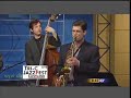 Here's what happens when six musicians, representing 3 different bands, meet at 6:30 AM at the local Fox affiliate TV station to promote the 28th annual Tri-C Cleveland JazzFest.Personnel are:Dave Sterner - Alto SaxChristopher Burge - Tenor SaxPaul Samuels - DrumsBeau Lisy - Percussion, (Drums on 3rd segment)Roger Friedman - KeyboardMatt Charboneau - BassBonus track at end: Candid green room footage of Beau with his new MacBook.