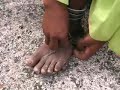 Raramuri Indian Ties His Huarache Sandals