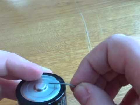 how to light a bulb with a d'battery