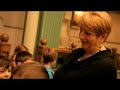Kathy Dunderdale with students at a House of Assembly