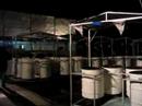 part of the sforzata steel pan yard showing the bass drums
