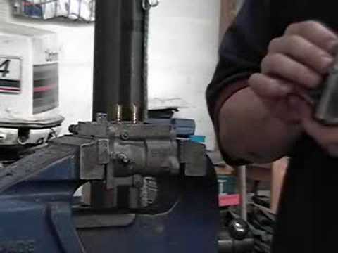 how to rebuild johnson outboard carbs