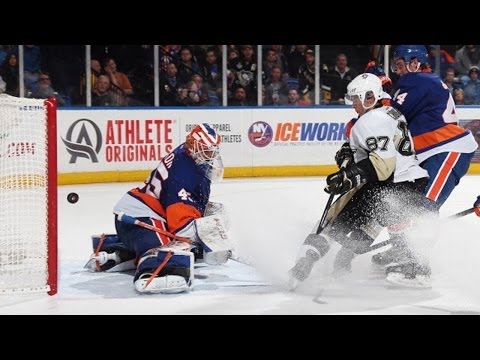 winner - Pittsburgh Penguins forward Sidney Crosby steals the puck at the blue line, then splits the D and flips one past New York Islanders goalie Anders Nilsson to ...