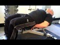 Extensión de piernas con mancuerna