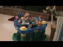 Playing in his exerciser Playing in his exerciser