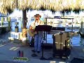 singing covers at a tiki bar