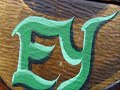 Faux wood grain on a metal garage door by ASUAREZ