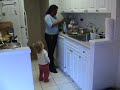 Melisende helps cook Melisende helps cook