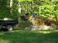 my cousin richard sisson and his friend mikey from little compton, moves rocks from my front yard.