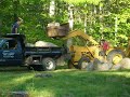my cousin richard sisson and his friend mikey from little compton, moves rocks from my front yard.