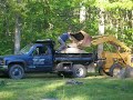 my cousin richard sisson and his friend mikey from little compton, moves rocks from my front yard.