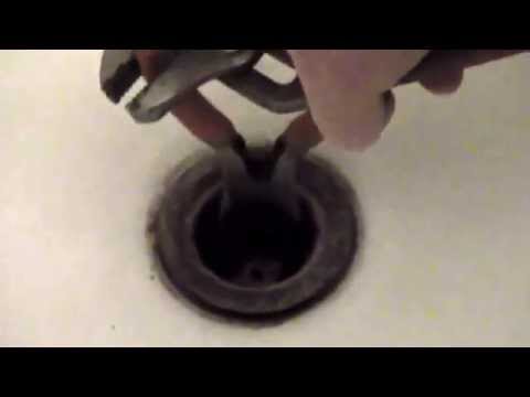 how to remove the drain on a bathtub