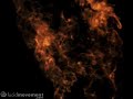 Slow motion flaming window close up.