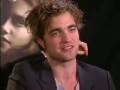 Kristen Stewart's hand behind RPattz