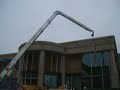 Oktopus Glazing machine  being used with a trailer crane