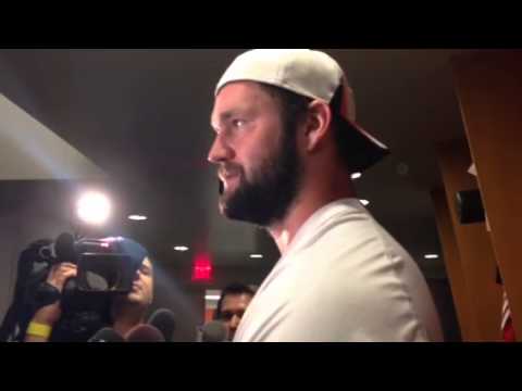 Margus Hunt, Leon Hall, and Carlos Dunlap from the Bengals locker room