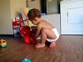 laughing baby at tickle me elmo