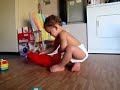 laughing baby at tickle me elmo
