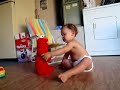 laughing baby at tickle me elmo