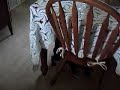Max, a black pug doing laps around the sofa