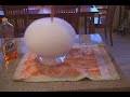 A little movie we made for our science project. For the first part, we have made a dry ice bubble in a bowl. The dry ice, or frozen carbon dioxide (C02), is denser than the air we breathe so the bubble eventually plops down. For the second part, we have a simple dry ice bomb. We just put dryice and water into the bottle and threw it into the yard, and a shard of the bottle actually hit the window on the second floor... For the third part, we constructed a cannon, firing a tennis ball over ...